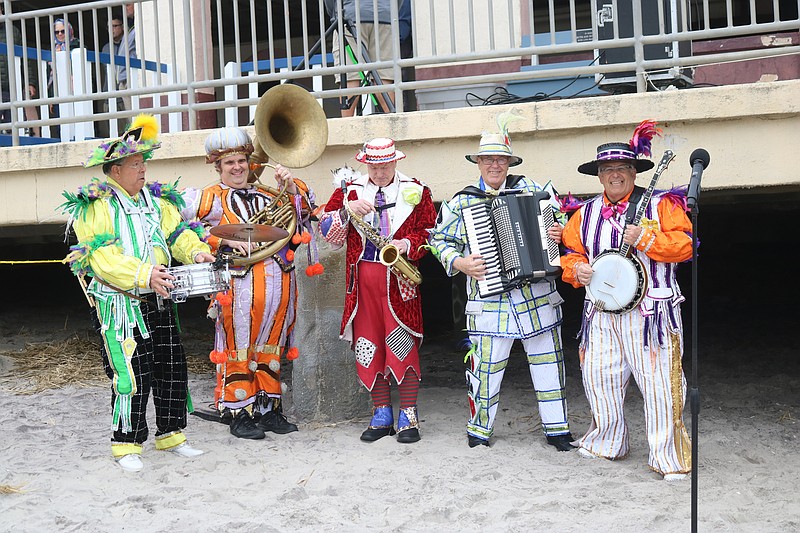 The string band serenades the crowd.