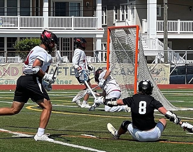 Ocean City goalie Henry Vaules makes a save in net. (Photos by Drew Fasy)