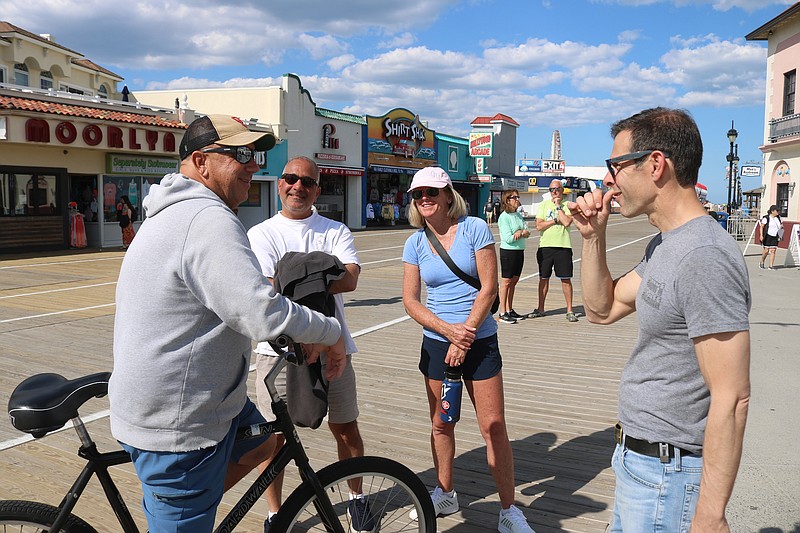 Boardwalk Merchants Association President Wes Kazmarck, at right, expresses confidence that the rest of the summer will remain calm.