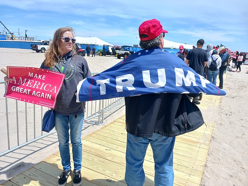 Tracey O'Riordan and Richard Sanchez show their support for Donald Trump.