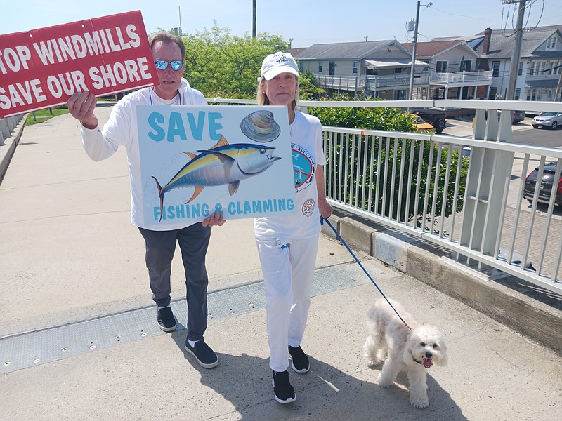 Wind farm opponents Bob and Mimi Glaspey of Margate are among the wind farm opponents walking across the bridge.