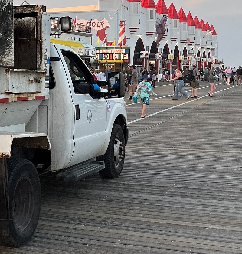 City crews often empty trash cans on the Boardwalk two or three times a night during the summer to keep pace. (Photo courtesy of Gina Hookey)