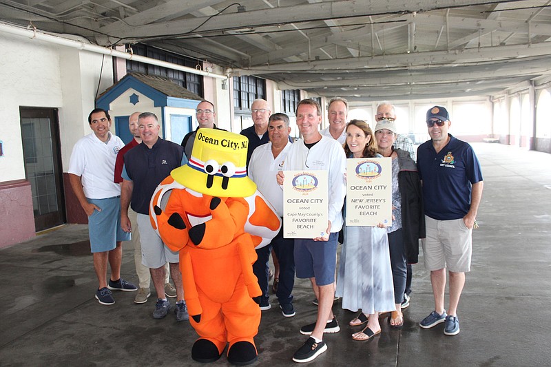 Ocean City dignitaries and officials display their latest honor.
(Photo courtesy of Ocean City)