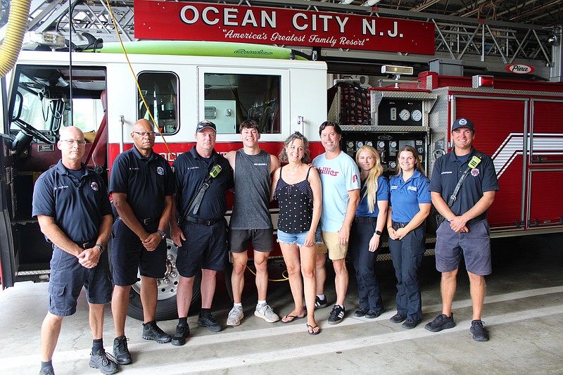 Maddux Childs, center, and his family are joined by first responders. (Photo courtesy of Ocean City)