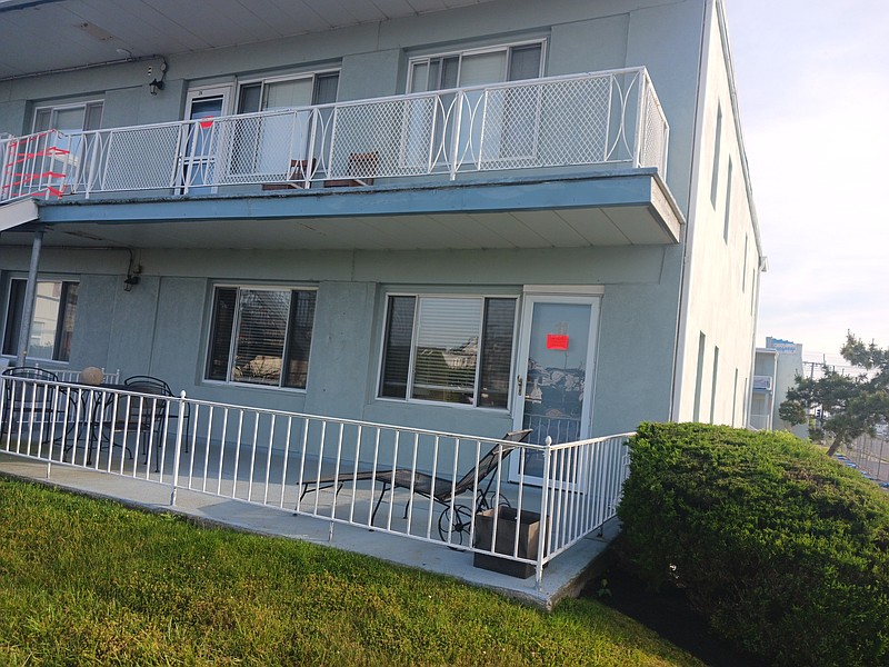 Red tags placed on the buildings declare that the property is “unsafe for human occupancy.”