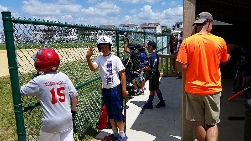 Boys competing in last year's  event in the 9-10 age group as they prepared to take their swings.