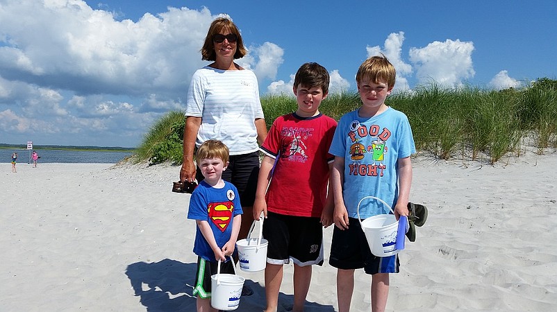 Maureen Paparo, a vacationer from Annandale, Va., brings her sons Michael, Joseph and John to the beachcombing tours every year.