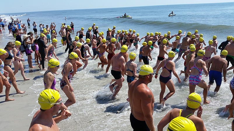 More than 200 swimmers charged into the surf Saturday for the start of the Sea Isle City Beach Patrol One Mile Ocean Swim.