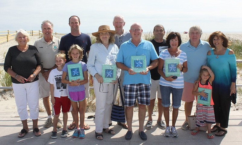 The Sea Isle City Environmental Commission is now accepting nominations for their 2016 Beautification Awards. Environmental Commission members Eleanor Moore (far left) and Dudley McGinty (second from left) are shown with several of 2015’s Beautification Award recipients: (from left) the Duncheskie family; Lorie & John McKiernan (accepting for Eagle Scout Ben Jargowsky); the Boyer Family; the Iannone family; and the Gleeson family.