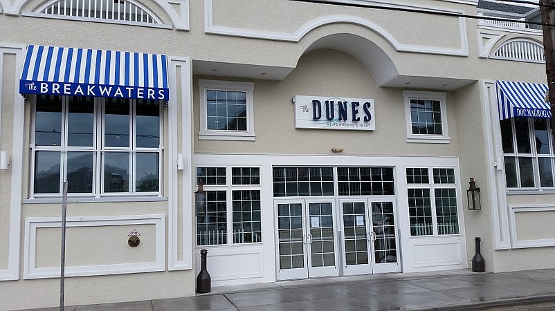 The Dunes project, combining restaurant space and 13 luxury condos in a three-story building, opened over the summer in Sea Isle City's Townsends Inlet section.