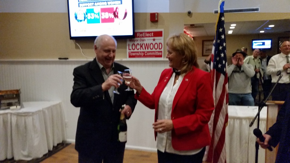 Cape May County Republican Freeholders Gerald Thornton and E. Marie Hayes celebrate their election victory with a champagne toast.