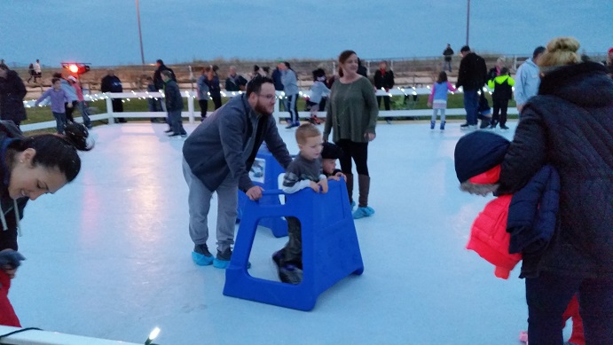 One popular attraction was a free ice skating rink. The surface was fake ice.