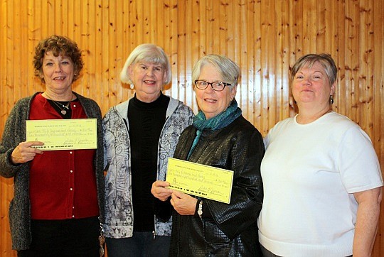 Using $3600 raised during their annual Card Party, the Sea Isle City Women’s Civic Club made donations to two local food pantries on November 14. Shown receiving checks for $1800 from Civic Club Vice-President Sue Grebe (second from left) and President Deb Genovese (far right) are Sarah Bartelson, of the Saint Casimir / Saint Maximilian Kolbe Food Pantry in Woodbine, NJ (far left); and Marion Matticola, of Holy Redeemer Food Pantry in Clermont, NJ.