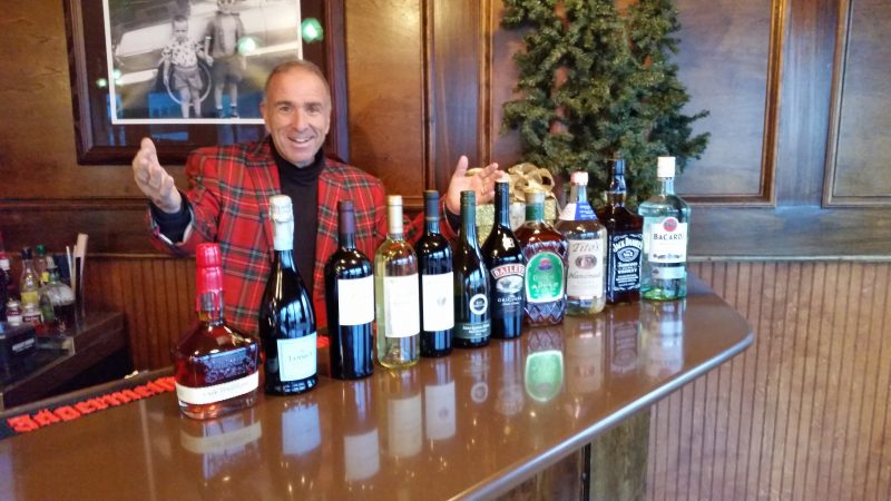 The mayor presents all 11 bottles of liquor, wine and sparkling wine included in his holiday list.