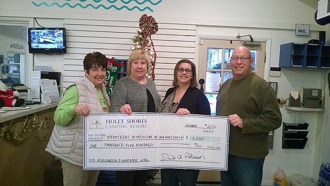  Pictured from left: Christine Salerno, Holly Shores General Manager; Jackie Meiluta, VIM Executive Director; Anne Marie Jackson, VIM Volunteer Coordinator; and Bill Salerno, Holly Shores General Manager, are shown during a recent check presentation, at which time Holly Shores Camping Resort in Lower Township donated $1500 to Volunteers in Medicine of South Jersey. The money will help provide quality health care to uninsured community residents. 