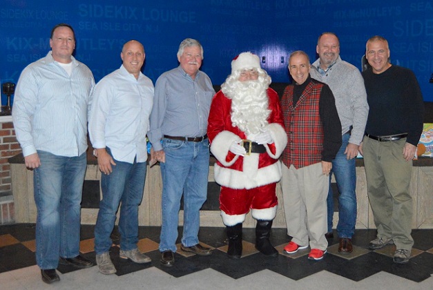 Mayor Desiderio, Santa and members of the Cape May County Police Chief's Associations: (From left to right) Cape May PD's Robert Sheehan, Ocean City PD's Chad Callahan, Cape May County Prosecutor Robert Taylor, CMC Prosecutor's Office Chief Paul Skill, CMC Police Academy Director Thomas DePaul