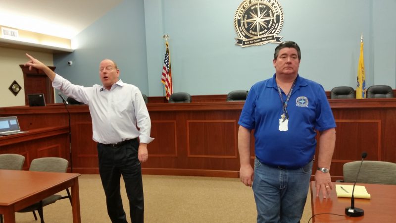 Consultant Jonathan Raser, left, and Sea Isle City Construction Official Neil Byrne explain the grant program during a community forum.