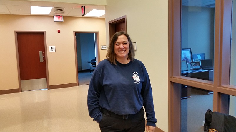 Kris Lynch, chief of the volunteer ambulance squad, said she needs more details about the city's plans for a professional EMS unit.