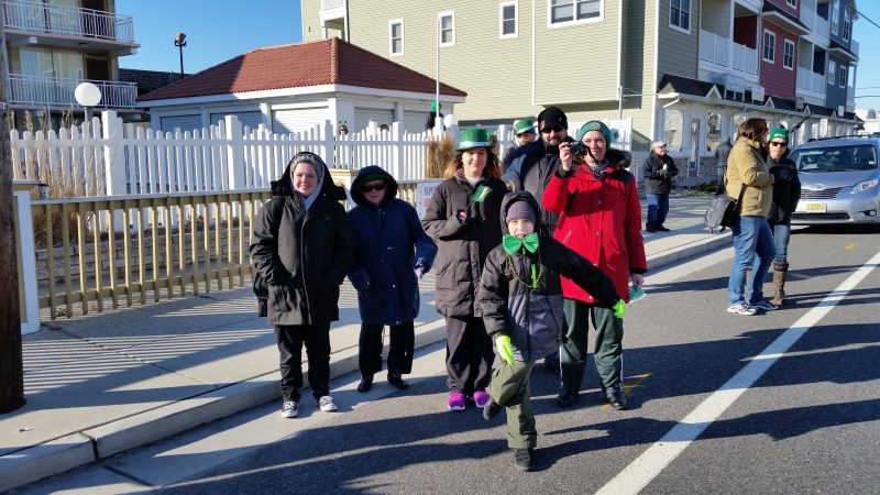 Spectators lining the parade route cheered to show their appreciation.