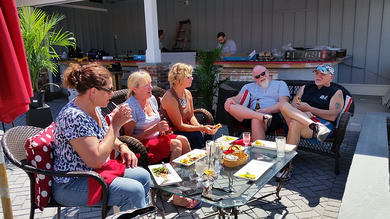 Outdoor dining has been a success since it was introduced in 2008, but city officials discussed ways of enhancing it this summer, including the possibility of longer hours.