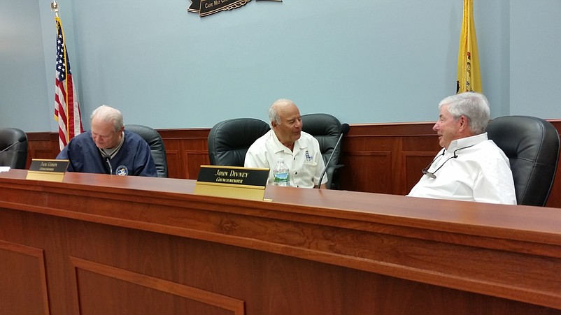 Councilman Jack Gibson, center, opposed the ordinance to extend the hours for outdoor music, while Councilmen William Kehner and John Divney supported it.