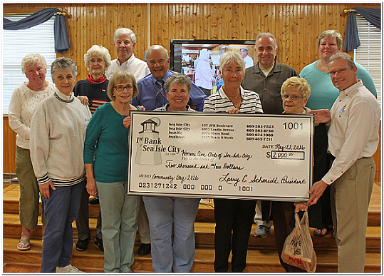   Each year on Community Day, First Bank of Sea Isle City presents a “Community Partnership Award” and a check for $2000 to a local civic organization that performs charitable deeds. During this year’s Community Day on May 20, AARP Chapter 710 will be the recipient of that honor.  Shown in 2016 receiving a Community Partnership Award from First Bank President / CEO Larry Schmidt (front, far right) are members of the Sea Isle City Women’s Civic Club, along with several elected officials.

 