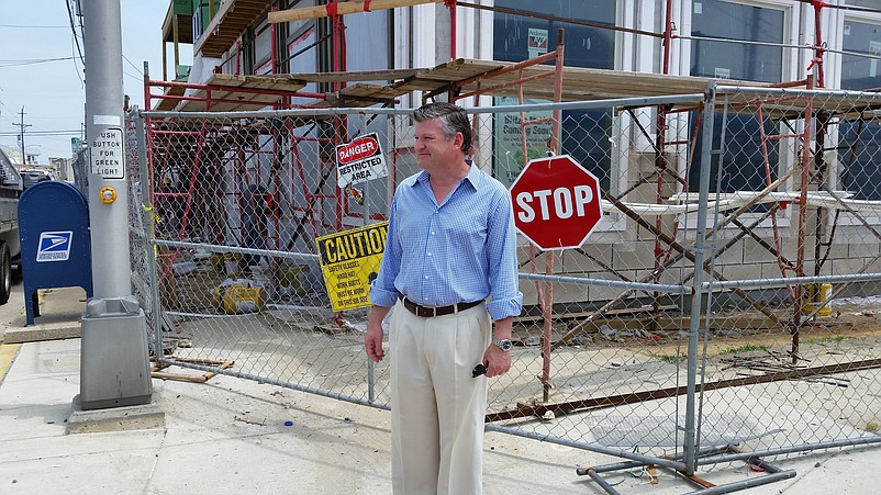 Developer Christopher Glancey stands in front of the Cape, one of the projects he is building to create a new commercial center in Townsends Inlet.