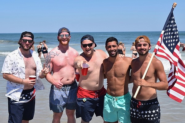 from left to right: Craiger, Derek Schatz, Brennan McCormick, Frank Lutz, and Keith Braccia with The American Flag