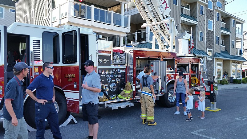 Children marveled over a fire engine that was parked next to Excursion Park during National Night Out in 2017.