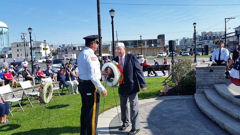 Sea Isle Police Chief Thomas D'Intino, left, and VFW Post 1963 Commander Charles "Chick" Haines participate in a wreath-laying ceremony.