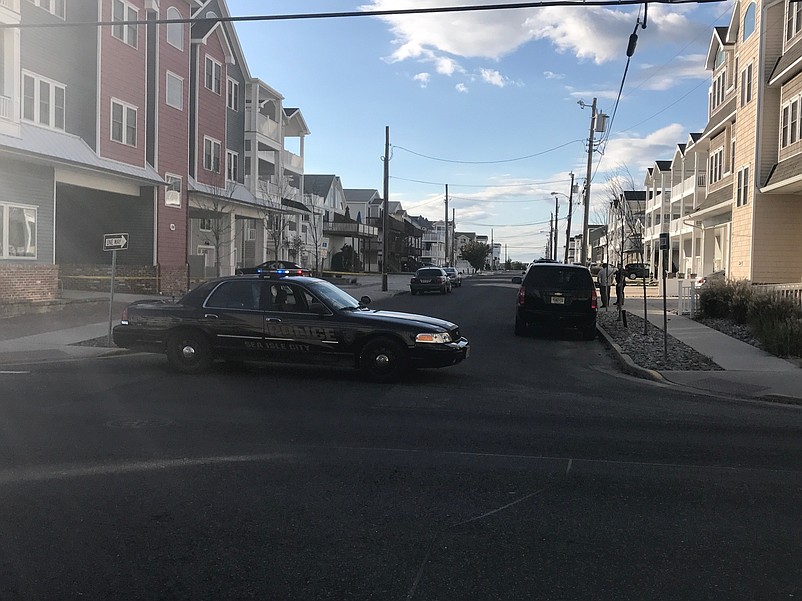 A Sea Isle City police car blocks off 36th Street on Sept. 30, the day authorities reportedly found explosives-making components, LSD and a handgun in the condominium complex on the left.