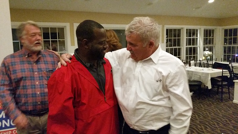 Republican Robert Nolan, right, who won a close race for Cape May County sheriff, accepts congratulations from Ocean City Councilman Antwan McClellan.