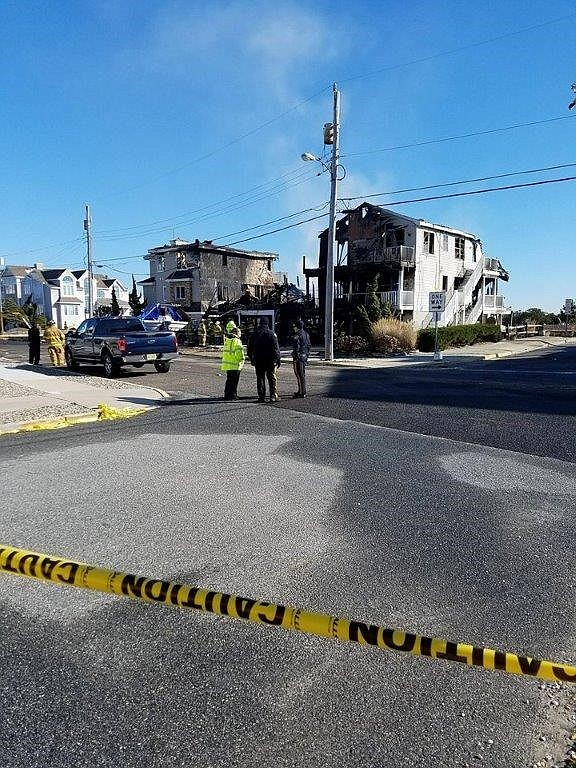 This photo of the aftermath of the fire shows one house burned to the ground and two others badly damaged, if not destroyed. (Facebook Katie Kahley)