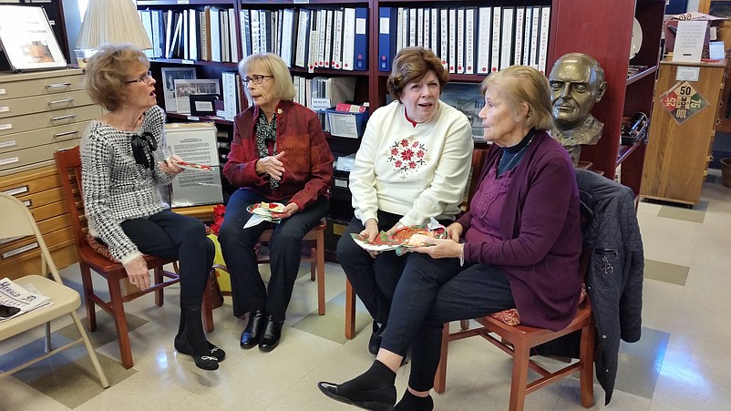 From left, Mary Anninos, Vera McQuillen, Anne Hall and Mary Stearne reminisce about Sea Isle's history during the open house.