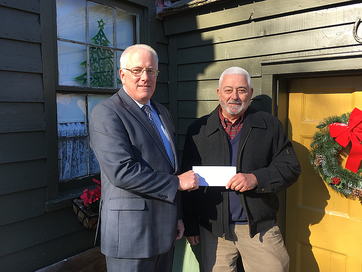 Photo Credit – Sturdy Savings Bank 

Sturdy Savings Bank’s Dennisville Branch Manager, Chris Hayes (left) presents Jack Connelly, President of the Dennisville Historic Home Owners Association with a donation check from the Bank benefiting the 28th Annual Historic Dennisville Christmas House Tour.
