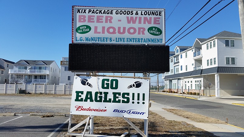 The "Go Eagles" sign at Kix-McNutley's indicates there will be a pro-Philadelphia crowd for the party.