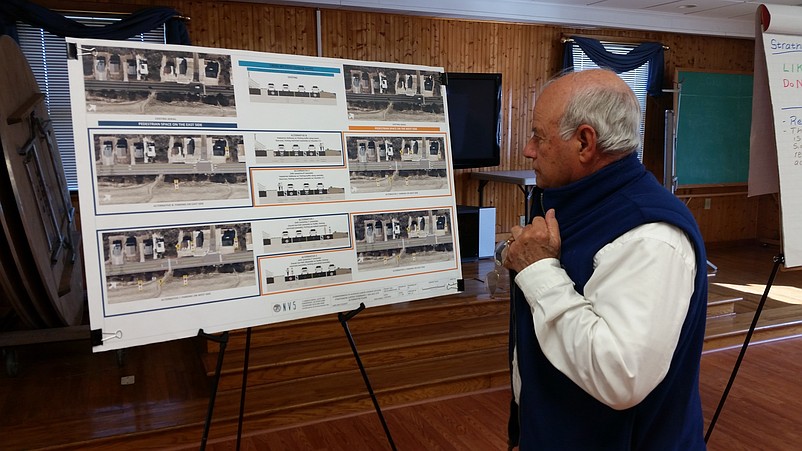 Sea Isle City Councilman Jack Gibson studies some of the renderings of the project.