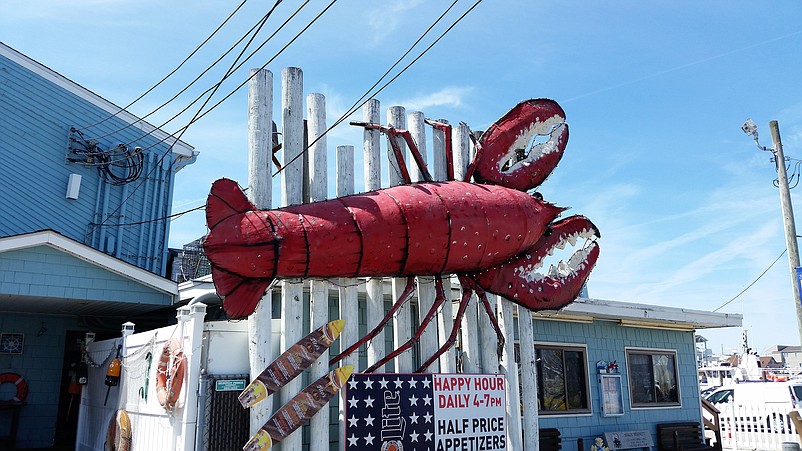 The big lobster that adorns the Lobster Loft in Sea Isle will be auctioned off for charity.