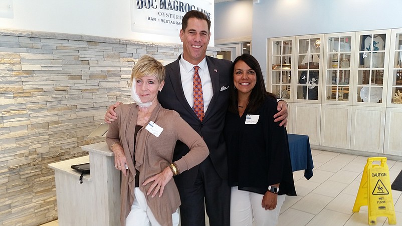 From left, Maureen Walsh is joined by Bringing Hope Home CEO Paul Isenberg and Family Outreach Coordinator Judy Swahl at Doc Magrogan's Oyster House in Sea Isle City.