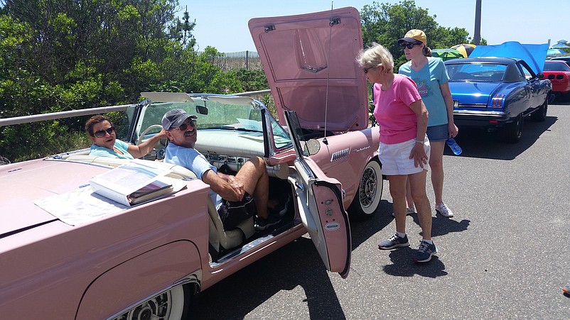 Robin and Stuart Cohen, of Vineland, show off their 1957 Ford Thunderbird convertible with its rare dusk rose color scheme.