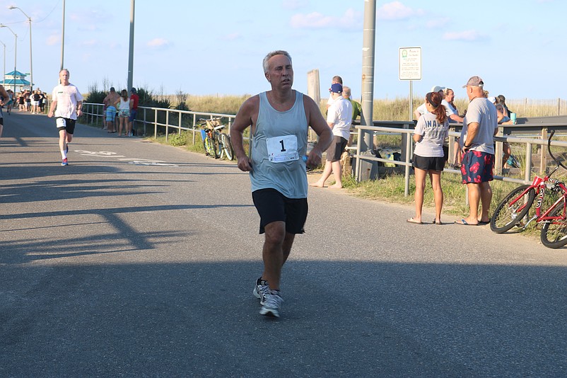 Mike Acquaviva says he isn't concerned with his time as much. He just loves running.