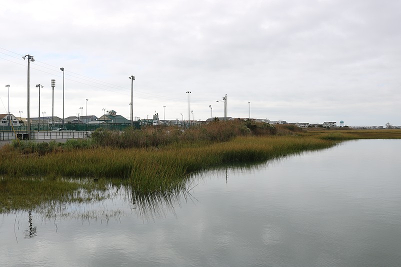 This area behind the Dealy Field recreation complex will be transformed with the public fishing pier and kayak launch project.