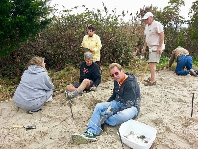 Sea Isle Terrapin Rescue founder Steve Ahern, in foreground, and other volunteers check out turtle nesting boxes at the Sea Isle library last fall.  (Photo courtesy of Steve and Susan Ahern) 