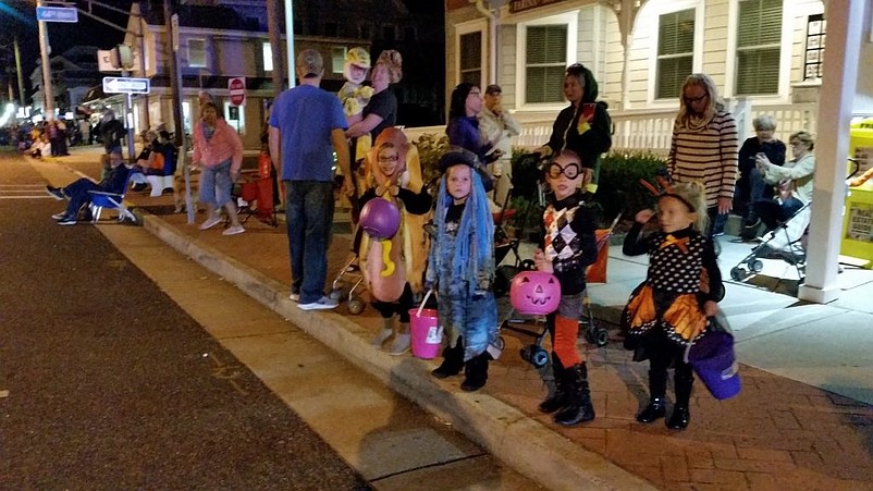 Children dressed in spooky Halloween costumes were part of the crowds lining the sidewalks along the parade route last year.