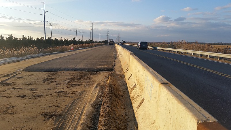 This view shows the new road taking shape on the left next to the existing boulevard on the right.