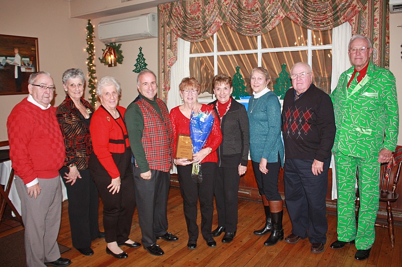 Joyce Molter (center) is shown with Sea Isle City Mayor Leonard Desiderio (fourth from left), AARP Treasurer Joe Robinson, Buffet and Bingo Chairperson Sis Borden, Sunshine Chairperson Monica Santarcangelo, Secretary Gerri Crudele, Vice-President Joann Gallagher, Past-President Tom Owings, and President Frank Roach at the AARP luncheon. (Courtesy of AARP) 