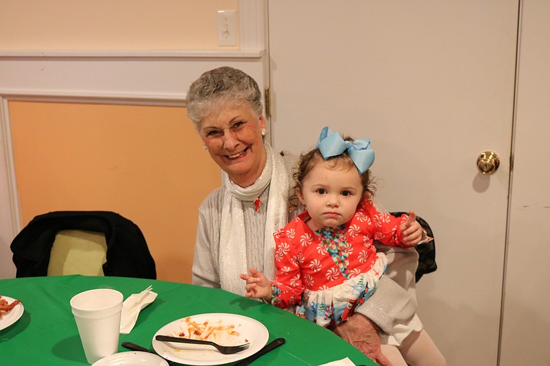 Sis Borden, of Sea Isle, holds her great-granddaughter, Charlotte Greto, of Sea Isle, 1.