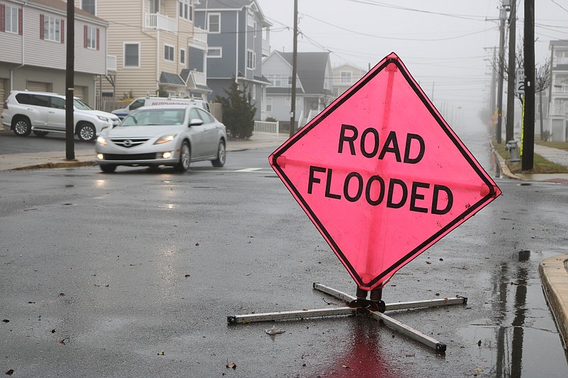 The "Road Flooded" sign on Central Avenue was no longer needed by Friday afternoon.