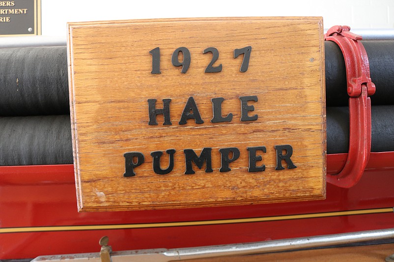 A wooden sign attached to the Hale pumper truck notes its 1927 origin.