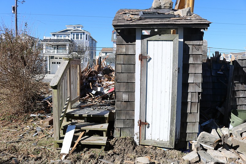 A storage area of the old house is one of the last parts of the structure to go.